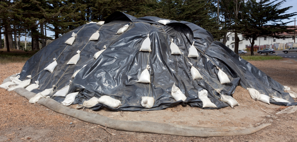 If your pile is too wet and doesn't have enough air, covering it with a tarp can help