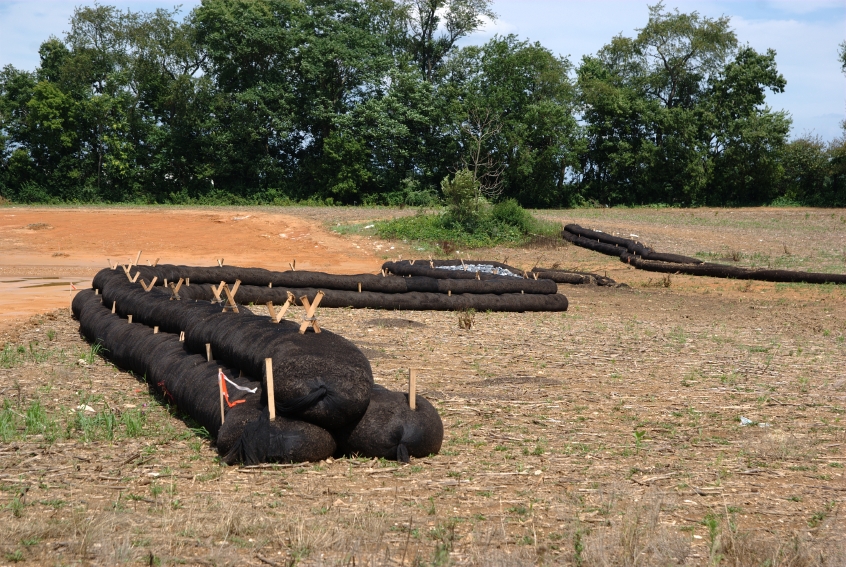 Berms or socks filled with mature compost can filter leachate from active compost piles